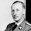 Reinhard Heydrich as Self - Views SS Parade with Other Officers by Hitler's Car
