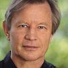 Michael York as Brian Roberts
