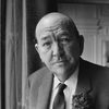 Noël Coward as Horacio Wilson