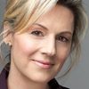 Val Cole as Morning Anchor Susan Harwood
