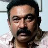 Baburaj as Puthumana Panicker