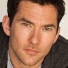 Luke McKenzie as Rhys