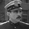 Christian J. Frank as Gendarme Using Snuff (uncredited)