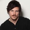 Brendan McCarthy as Carl