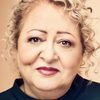 Lily Farhadpour as Mina's neighbour