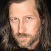 David Lovgren as Curator