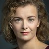Lucy Russell as American Woman