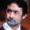 Luis Delgado as The Hatman (loses hat to Costain)