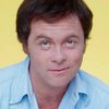 Christopher Murney as Camp Loman