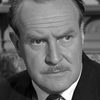 Robert Raglan as FO Official