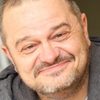 Greg Baldwin as Nobita's Dad