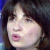 Véronique Poulain as La cliente du marché