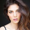 Razane Jammal as Carrie Kristo