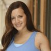 Natalee Phillips as Club Bottle Server