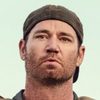 Scott Foxx as Travis Carter