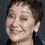 Gloria Ben as Teacher