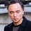 Glen Eaton as Johnny Yu