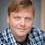 Andrey Savostyanov as Ruddy-faced man