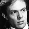 Michael Gothard as Locque