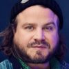 Brady Corbet as Simon