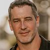 David D. Ford as Tim Dofarty