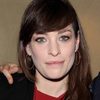 Sia Berkeley as Smart Hotel Receptionist