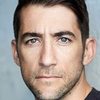 Jonathan Togo as Intern
