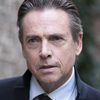 Rupert Wynne-James as Martin (Curator)