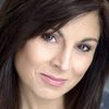 Valerie Smaldone as TV Newscaster