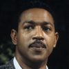 Julius Carry as Coach