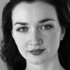 Amy Molloy as Mother in Raided House