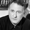 Gilles Margaritis as Le camelot (peddler)