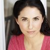 Susan Papa as Radio Announcer (voice)