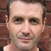 Brendan Wall as Detective
