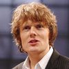 Julian Rhind-Tutt as James