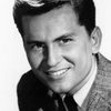 Billy Gray as Bobby Benson