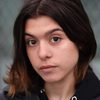 Sara Luna Zoric as Snack bar cashier