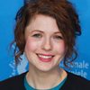Hannah Steele as Carrie