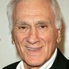 Dick Latessa as Father Gianni Delmonico