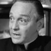 Charles Andre as French Train Conductor(uncredited)