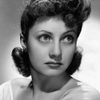 Diana Lewis as Judy Sanford
