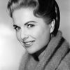 Martha Hyer as Angela Cole