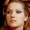 Helga Liné as Lola, la moglie del farmacista
