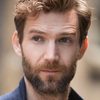 Simon Harrison as Tim