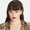 Sarah Booth as Tiana Simms