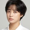 Park Hee-von as Female Cop at Police Station