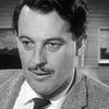 Bruce Beeby as Captain at Officer's Club (uncredited)