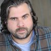 Andrew Olson as Caden