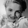Donna Lee as Street Singer