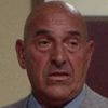 Eolo Capritti as Magalini, notary